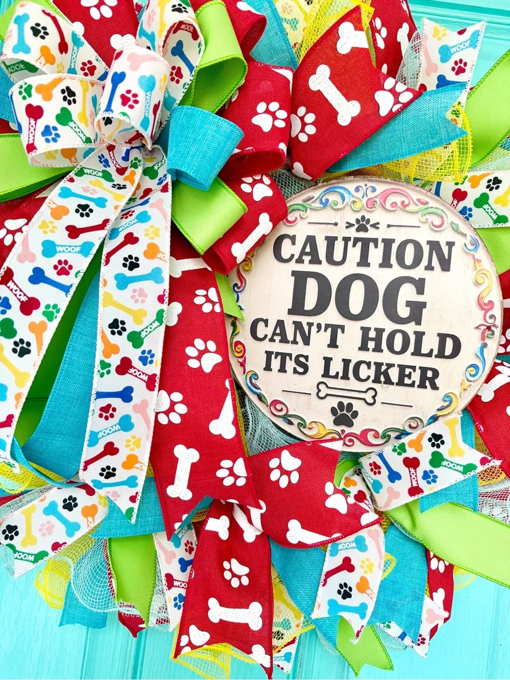 Caution Dog Can’t Hold Its Licker Decorative Pet Wreath - Red & Teal Accents